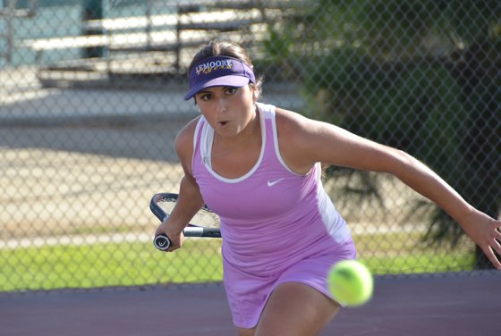 Lemoore's No. 1 singles player Kaitlin Raulino won her match Wednesday to lead the Tigers to the win.